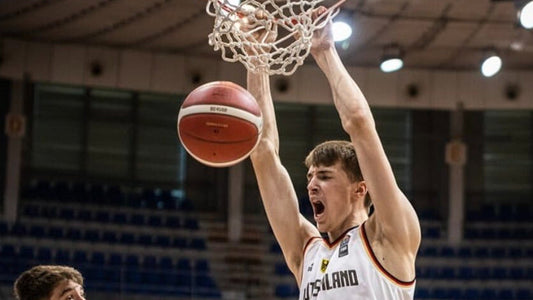 German center Johann Grünloh commits to Virginia